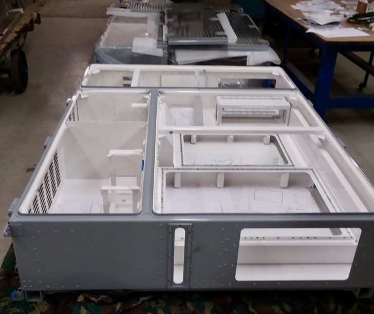 Custom Aluminum Assembly with countersunk Riveted Construction fabricated and powder coated for the Transportation Industry by DAWSON